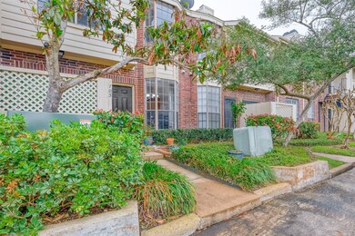Beautiful landscaping and greenery out front.