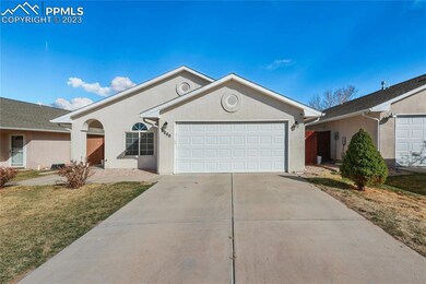 Low maintenance level lot with 2-car garage