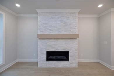 This home will have a stacked quartzite surround l