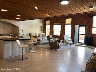 Applewood Greatroom Leading to Pool Deck