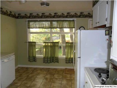 Kitchen view showing breakfast area, overlooking r