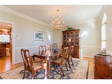 Dining Room has double crown molding, applied mold