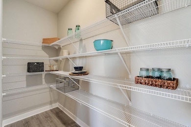 Tucked smartly into the corner of the kitchen space, this oversized panty to sure to offer you the storage space you need! Photo of model, colors/finishes may vary.