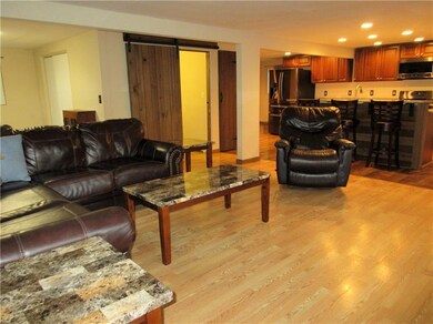 The open floor plan creates a great space for ente