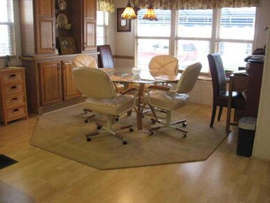 Living Room. Comfy & attractive with lots of windo