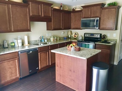Granite Counter tops, hardwoods, upper and lower cabinets