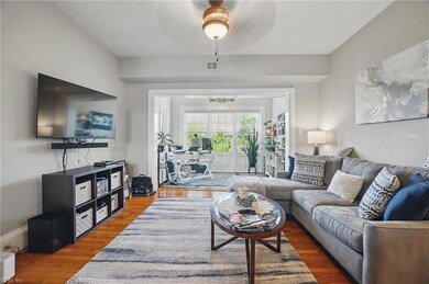 Elegant living room leading to sun room