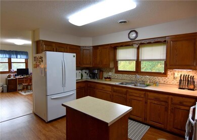 Open concept kitchen with outside views