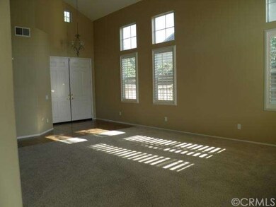 VIEW OF DOUBLE DOOR ENTRY WITH CUSTOM TILE WALKWAY