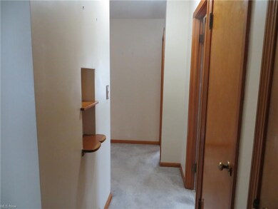 Hallway to bedroom and bathroom