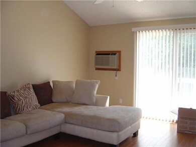 Living Room. Neutral dcor living room with sliders