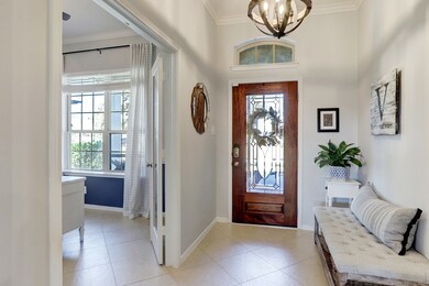 Step inside the entry hall and notice the tall ceilings, tile floors, and updated light fixtures. There is a transom window above the front door for additional light as well. And if energy efficiency is what you are looking for, you have come to the right place!