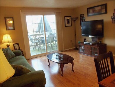 SPACIOUS LIVING ROOM WITH UPDATED SLIDING GLASS DO