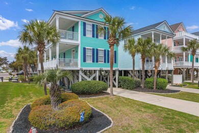 View of front of property with a front lawn and co