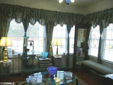 Other - Sunroom with Two Walls of Windows