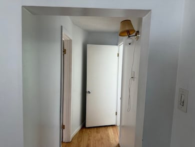 Hallway to bedroom and bathroom
