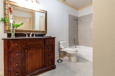 Primary bathroom has new tile, granite countertop