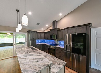 Kitchen. Sliders open onto spacious patio.