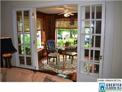 Glass, French doos leading to sun room