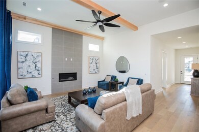 Large windows flood the space with natural light,