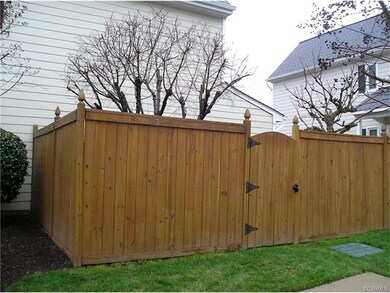 Nice privacy fence surrounds the bluestone patio