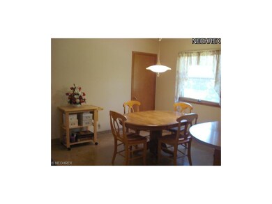 The dining area offers a large storage closet and 