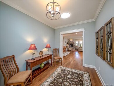 This spacious foyer sets the tone for the wonderfu