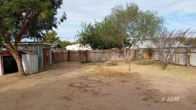 REAR YARD LOOKING WEST