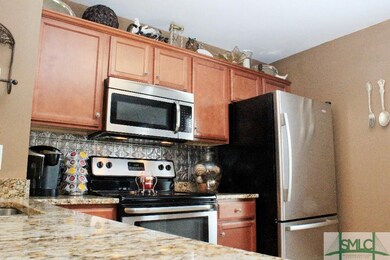 Wow! Granite counter tops, metallic backsplash and