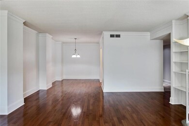 Living Room looking toward Dining room, built-in b