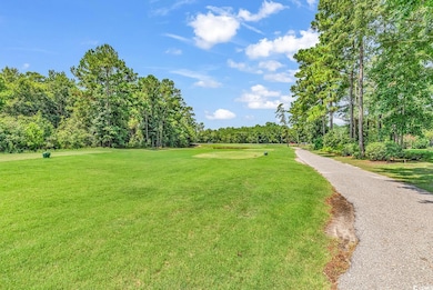 Surrounding community featuring a lawn