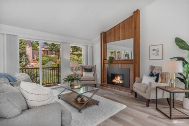 This newly remodeled home is a show stopper with vaulted ceilings, open-concept living, clean designer finishes & light/bright windows.