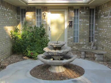 Large courtyard with fountain welcomes guests