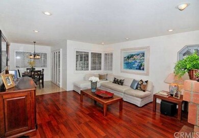 Separate family room with gorgeous flooring, plant