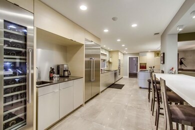 Custom built cabinets, Thermador appliances, wine 