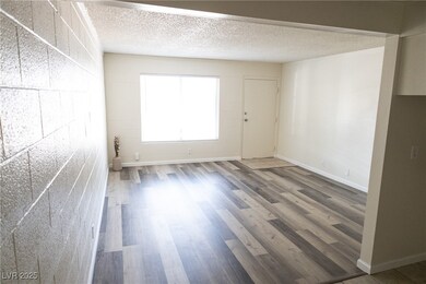 Spacious living area with brand new LVP flooring +