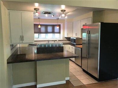 Kitchen cabinets have been given a face lift. Sand