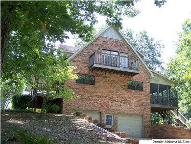 SIDE OFHOME.  MASTER BEDROOM BALCONY 2 CAR BASEMEN