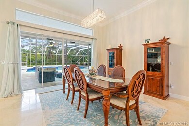 Dining area with sliding glass doors to covered la