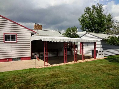 Exterior Front. Side view of Large Addition and co