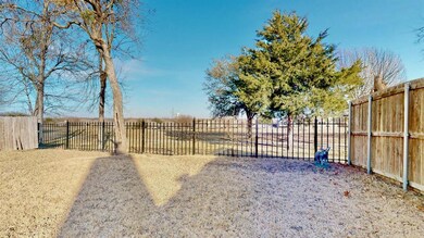 Property backs open land, formally a golf course.