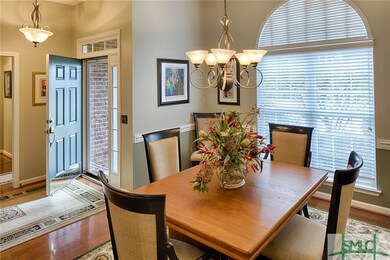 Spacious forrmal dining area with custom window tr