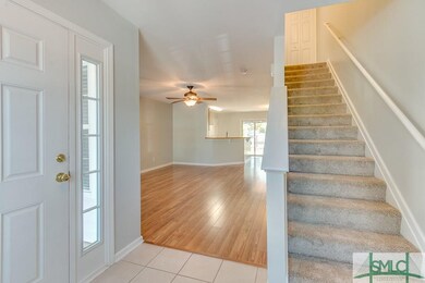 Foyer Entry is tiled.  No carpet downstairs.