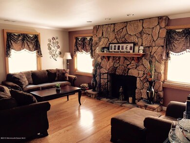 Living Room with Stone Fireplace