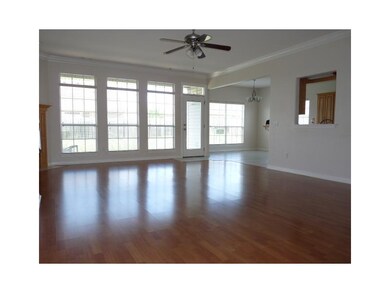 Living Room. Plenty of natural light is allowed to enter the house to provide a bright, airy atmosphere.