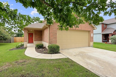 View of front of home with a garage, concrete dri