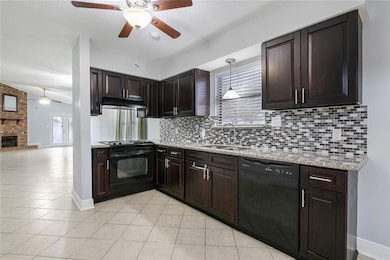 SPACIOUS KITCHEN WITH AMPLE CABINETS