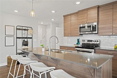 1402 Newport Ln, Raymore, MO 64083 - photo 4