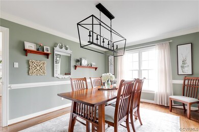 Alternate view of the formal dining room with refi
