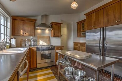 Chef's dream kitchen with gas cooktop and over-siz